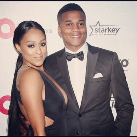 Actor Cory Hardrict poses with wife Tia Mowry